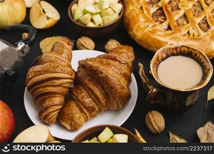 croissants coffee near apples pie