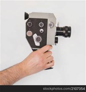 crop cameraman with vintage gadget