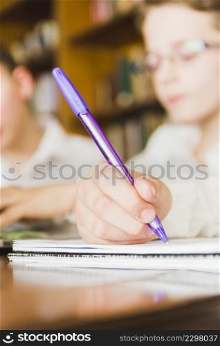crop child s hand writing school copybook