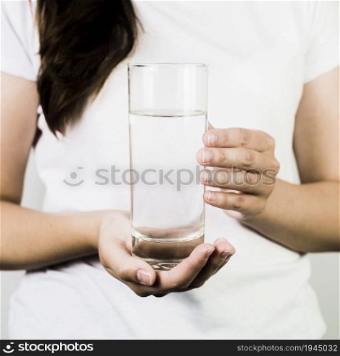 crop female hands holding glass water. High resolution photo. crop female hands holding glass water. High quality photo