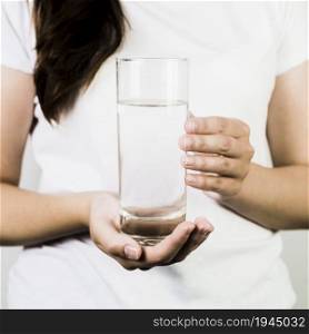 crop female hands holding glass water. High resolution photo. crop female hands holding glass water. High quality photo