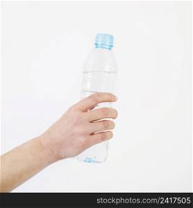 crop hand with water bottle