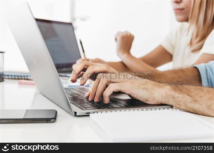 crop hands typing laptop workplace