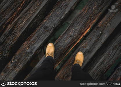 crop legs wooden bridge