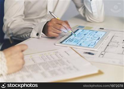 crop people working with plans tablet. High resolution photo. crop people working with plans tablet. High quality photo
