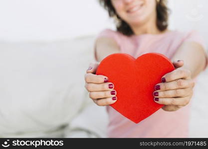 crop woman showing heart shaped box. High resolution photo. crop woman showing heart shaped box. High quality photo