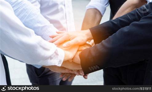 Cropped Image Of Business People Showing Unity