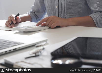 Cropped image of professional businesswoman working at her office via laptop  young female manager using portable computer device 