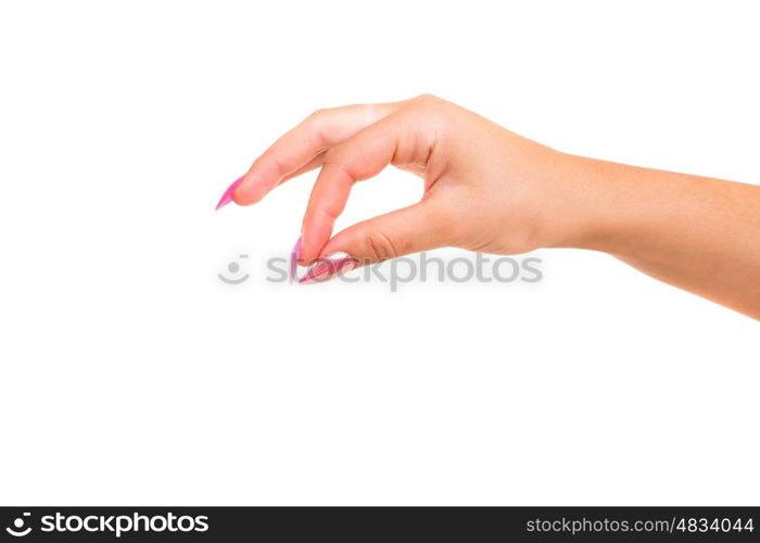 Cropped view of a female hand picking something up