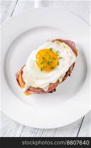 Croque madame hot sandwich made with ham, egg and cheese