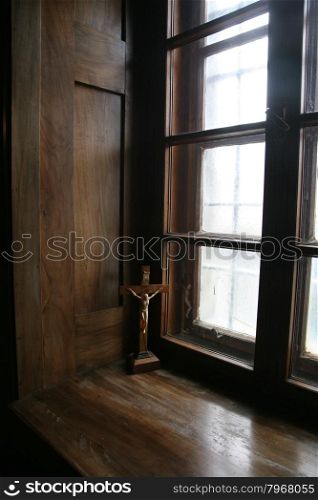 Cross at the window