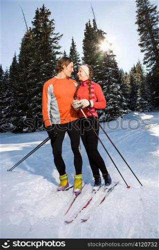 Cross Country Snow Skiiers Smiling at Each Other