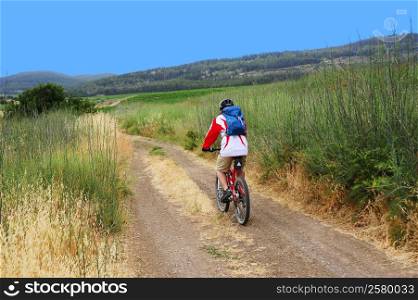 Cross country track through mountains, forests and fields