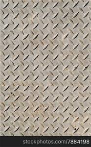 Cross-hatched metal anti-skid surface background pattern.
