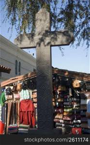 Cross in front of a market stall, Olvera Street, City Of Los Angeles, California, USA