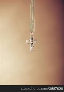 Cross necklace pendant. Christian religion faith symbol. Christianity. Instagram filtered.. Cross necklace pendant. Christian religion faith.