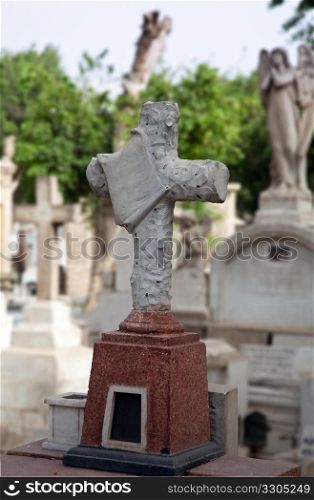 Cross on grave in cemetery in Coptic Christian region of Cairo in Egypt
