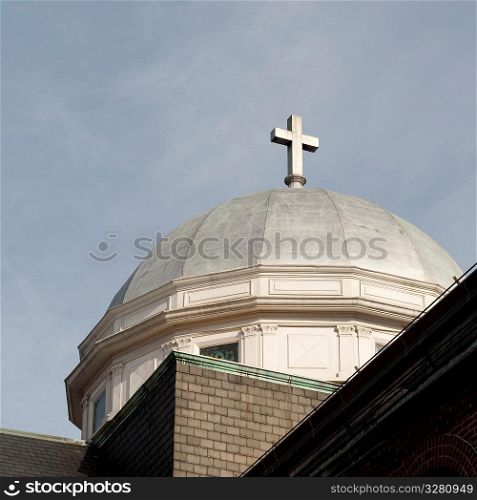 Cross on the rooftop dome in Boston, Massachusetts, USA