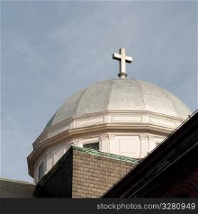 Cross on the rooftop dome in Boston, Massachusetts, USA
