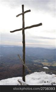 Cross on top of the Carpathian mountain Pikuy. Ukraine