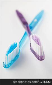 Crossed toothbrushes