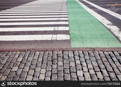 crosswalk, bicycle lane and pavement
