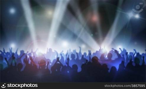 Crowd of cheering silhouettes in a packed arena with spotlights and camera flashes