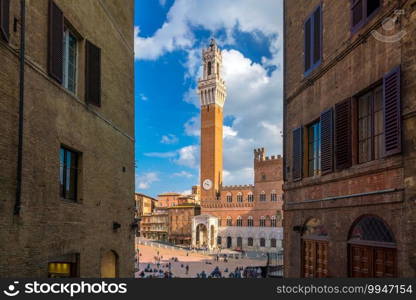 Crowd of people in Piazza del C&o square in Siena, Italy