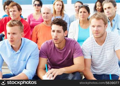 Crowd Of Spectators Watching Outdoor Sports Event