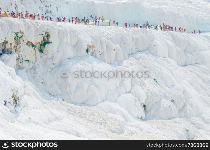 crowd of tourists on the mountain Pamukkale in Turkey