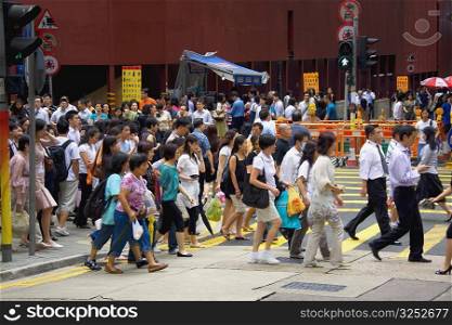Crowd walking in a street, Hong Kong Island, Hong Kong, China