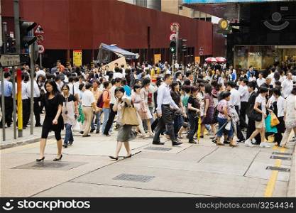 Crowd walking in a street, Hong Kong Island, Hong Kong, China