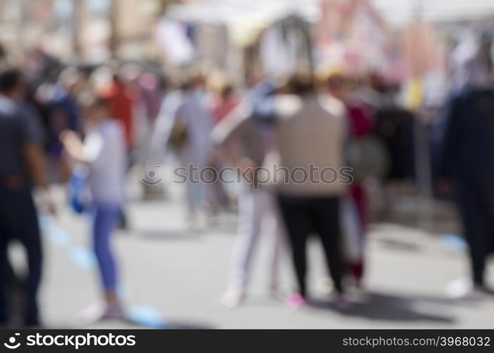 Crowded blurred street in Mallorca,Spain. Blurred people background.