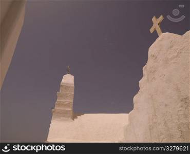 Crucifix on top of church in Mykonos Greece