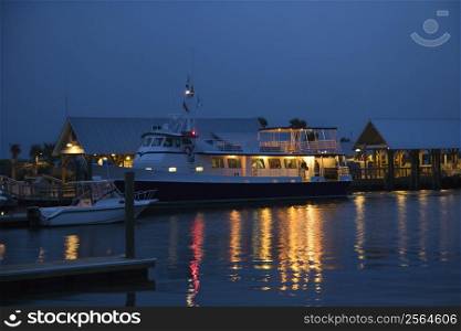 Cruise boat docked at night on Bald Head Island, North Carolina.