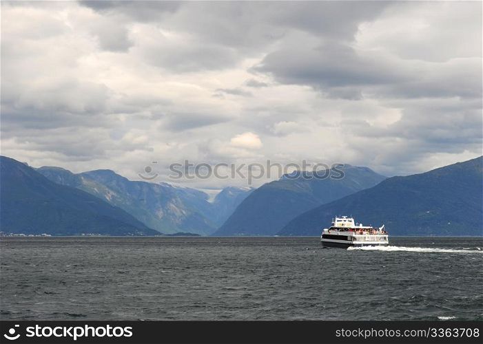Cruise liner in norwegian fjords