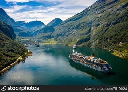 Cruise Ship, Cruise Liners On Geiranger fjord, Norway. The fjord is one of Norway&rsquo;s most visited tourist sites. Geiranger Fjord, a UNESCO World Heritage Site