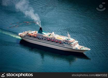 Cruise Ship, Cruise Liners On Geiranger fjord, Norway. Tourism vacation and traveling.