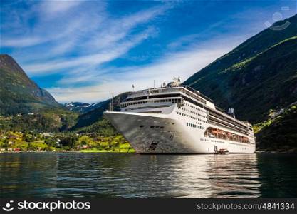 Cruise Ship, Cruise Liners On Geiranger fjord, Norway. Tourism vacation and traveling.