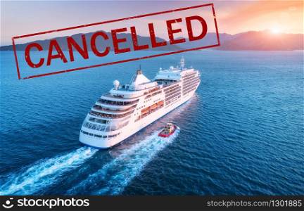 Cruise ship travel holidays cancelled because of epidemic of coronavirus. Crisis in the cruise industry. Cruise cancellation because of pandemic of Covid-19. Quarantine in cruise liner. Red text