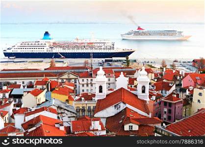 Cruise ships in Lisbon harbor at dusk. Portugal