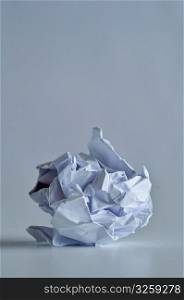 Crumpled ball of blank paper.