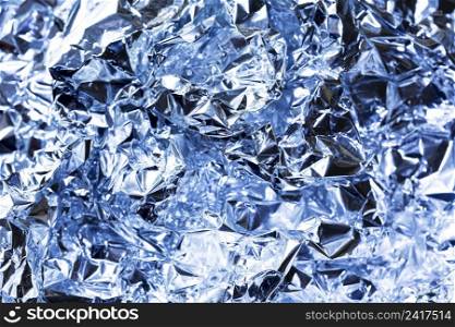 crumpled blue aluminium foil background