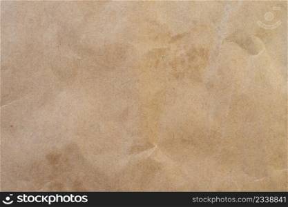 crumpled brown paper background and texture with copy space.