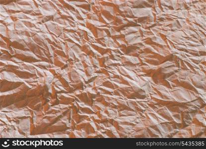 Crumpled brown Paper from a package as background texture
