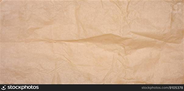 Crumpled brown parchment paper, full frame