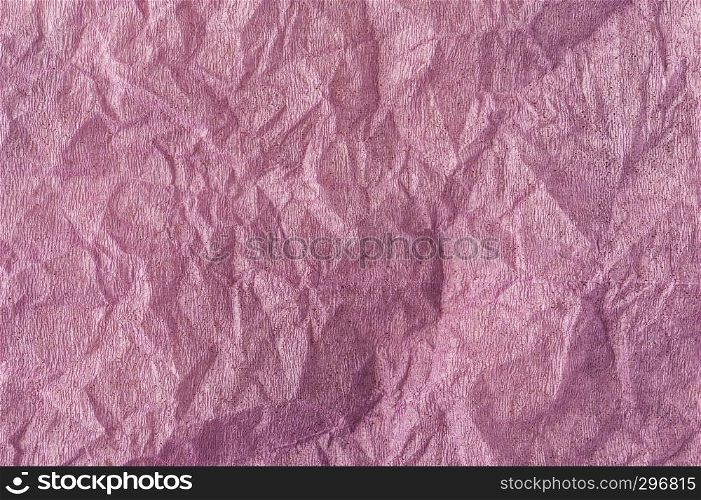 Crumpled old pink paper texture. Abstract grunge background. Distressed and industrial backdrop design. Dirty detail grain pattern.. Grunge pink paper texture. Crumpled old dirty cardboard distressed and industrial background design.