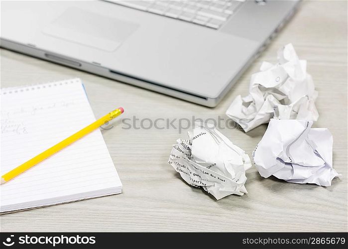 Crumpled Paper and Notebook