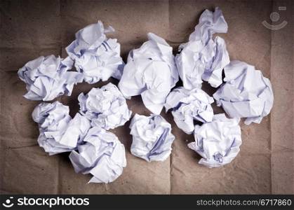 Crumpled up paper balls of white paper