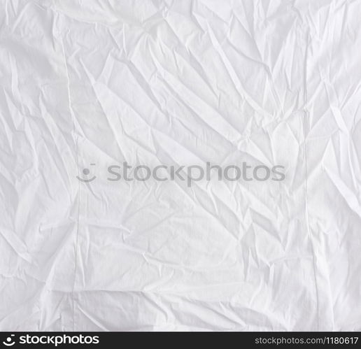 crumpled white cotton fabric, fabric for sewing clothes and shirts, full frame